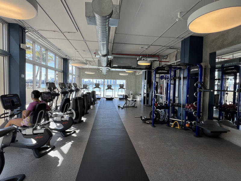 gym with water view