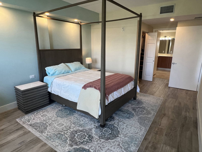 master bedroom with bathroom at the end of the corridor 