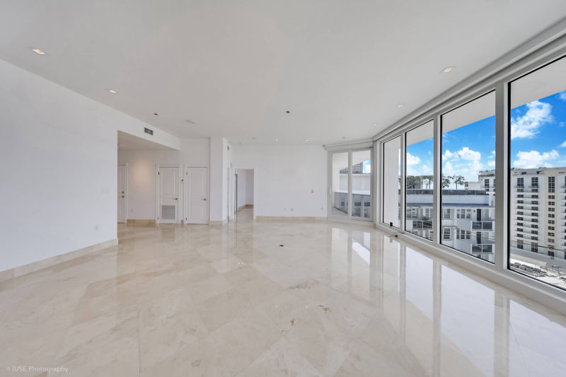 living room with view of other penthouse